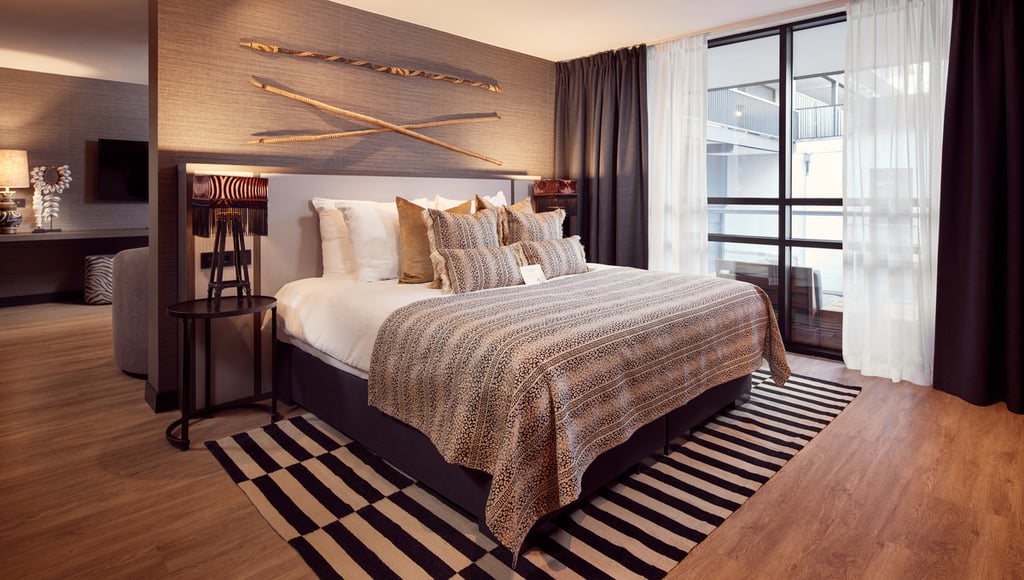 carousel_room_1024x768_Afrika-014-Bed.jpg