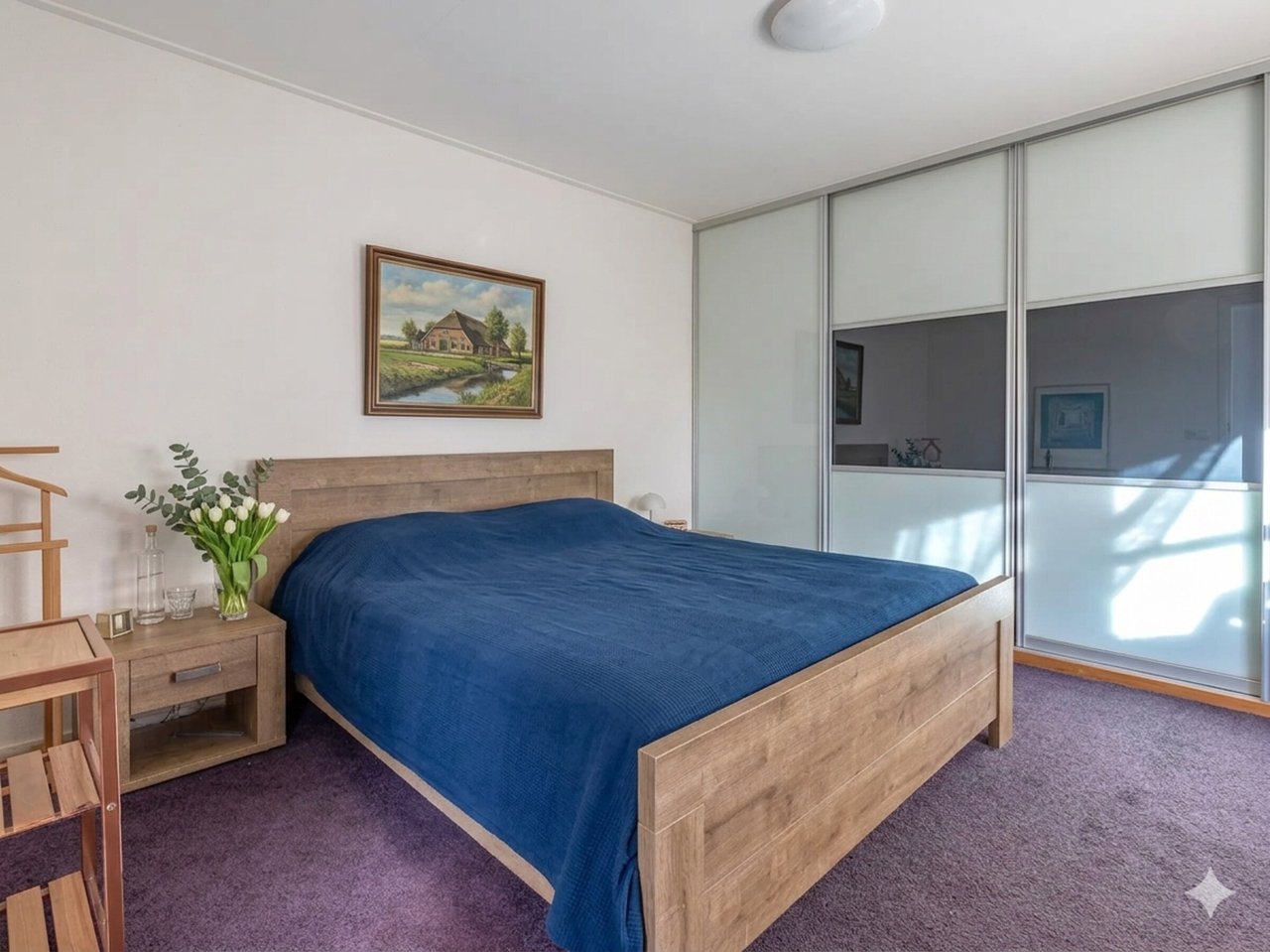 Een slaapkamer in het Voorhuis